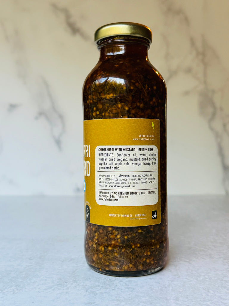 A bottle of Argentine Style Chimichurri with Mustard sauce, featuring its label with ingredients 
