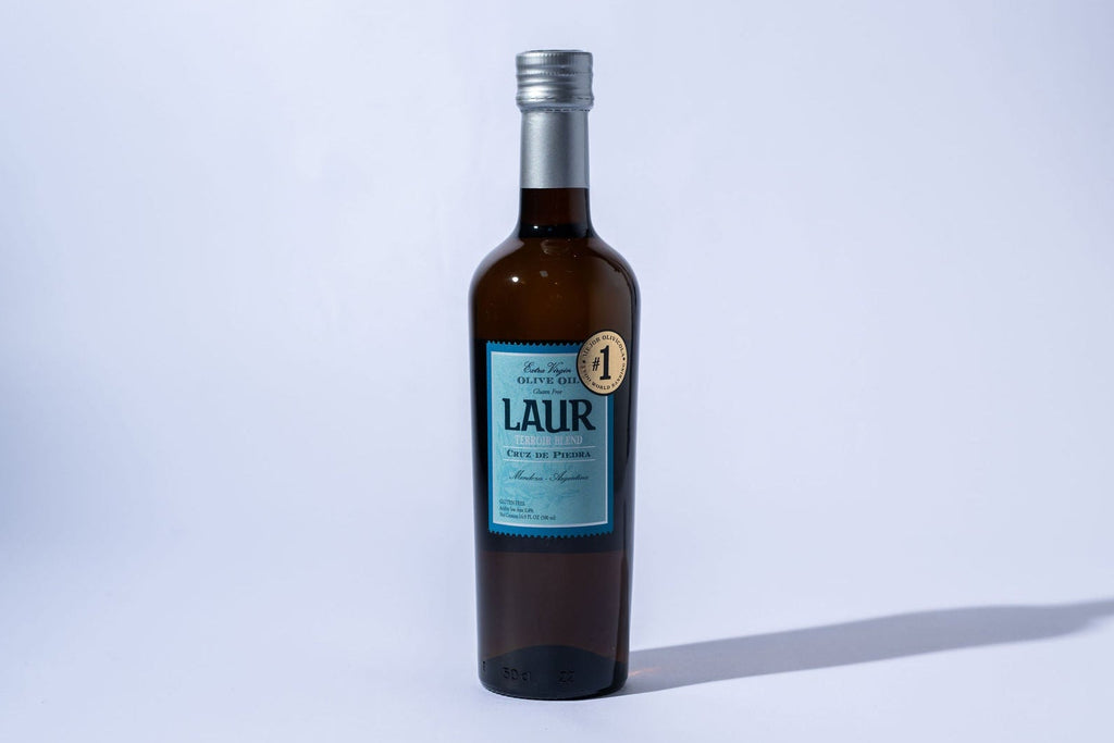 Bottle of Laur cruz olive oil on a white background