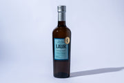 Bottle of Laur cruz olive oil on a white background