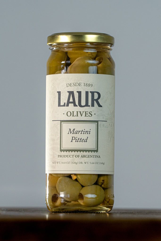 Close-up of Martin Olives - Pitted, showcasing their firm texture and vibrant appearance. These fresh, flavorful olives are perfect for cocktails and appetizers, offering a unique South American touch