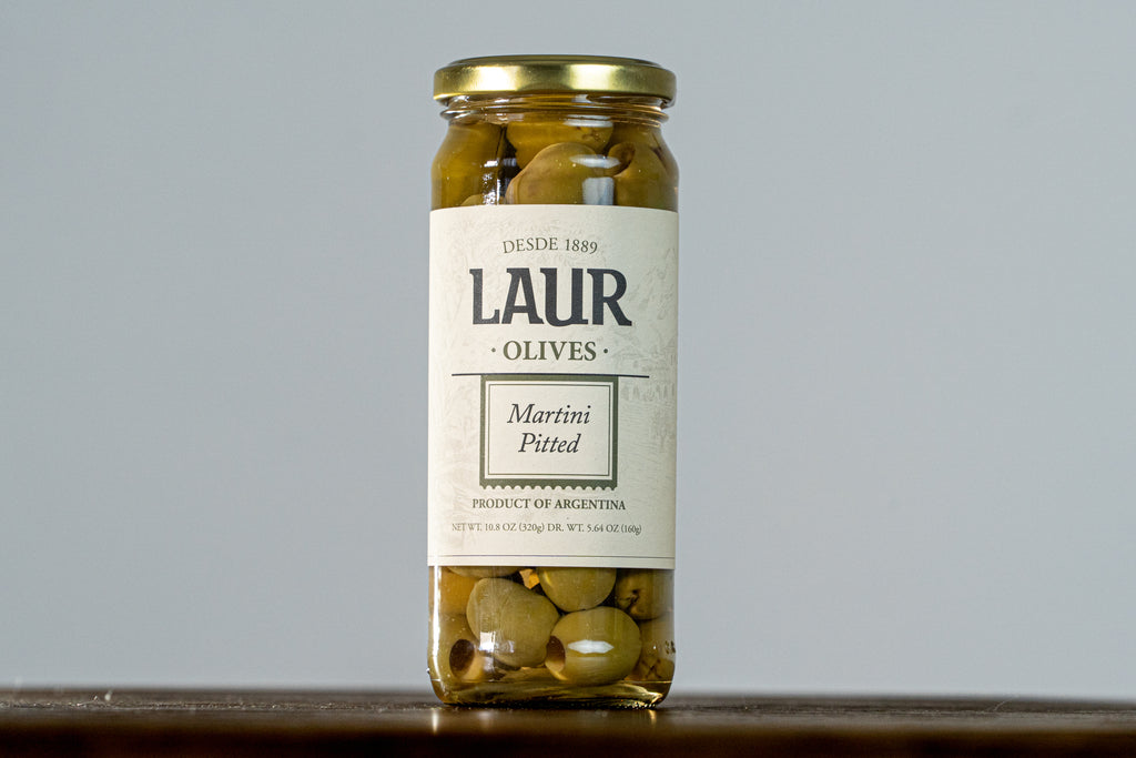 Close-up of Martin Olives - Pitted, showcasing their firm texture and vibrant appearance. These fresh, flavorful olives are perfect for cocktails and appetizers, offering a unique South American touch