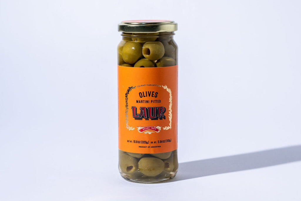 Jar of olives with a label on a white background