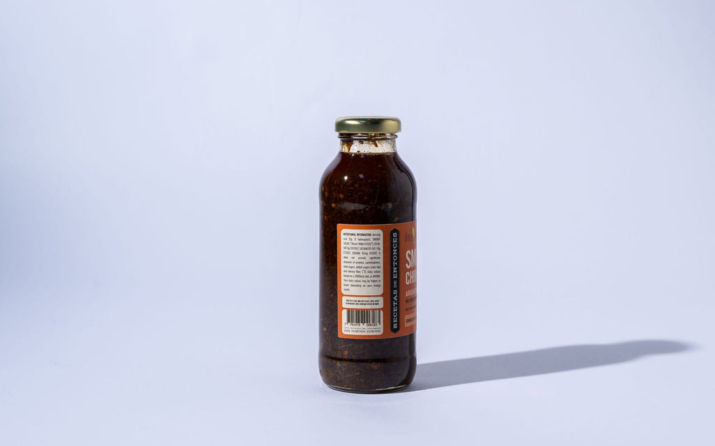 Bottle of smoked chimichurri with a label on a light gray background