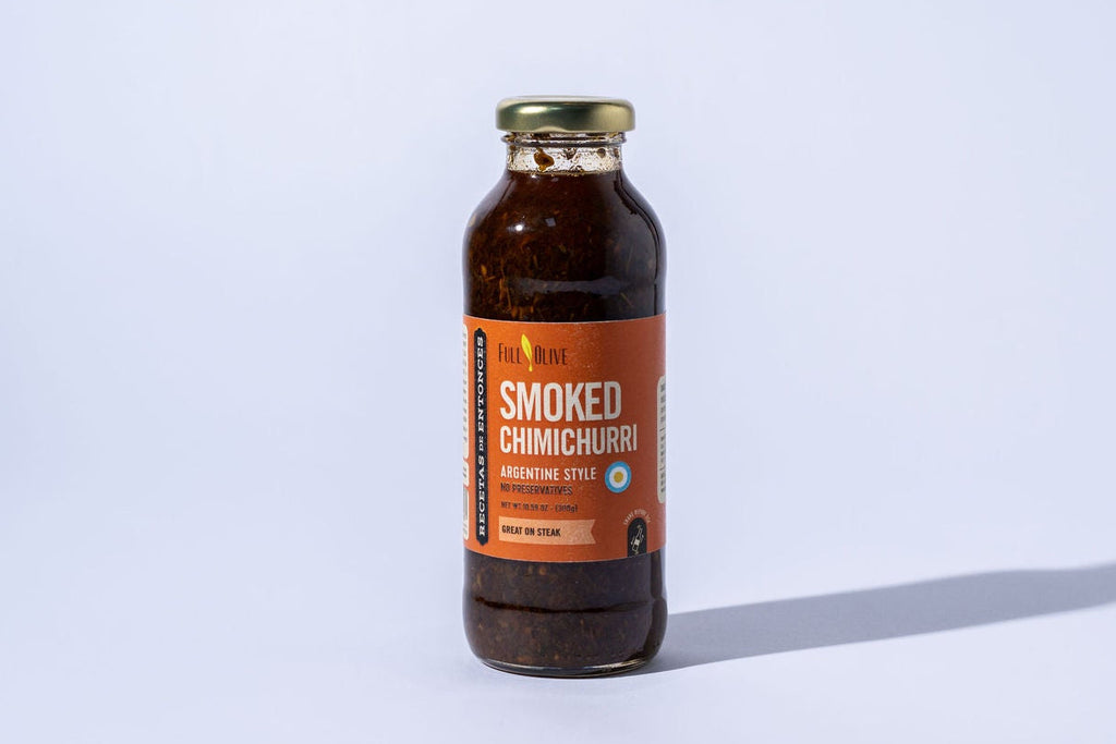Bottle of smoked chimichurri sauce on a white background