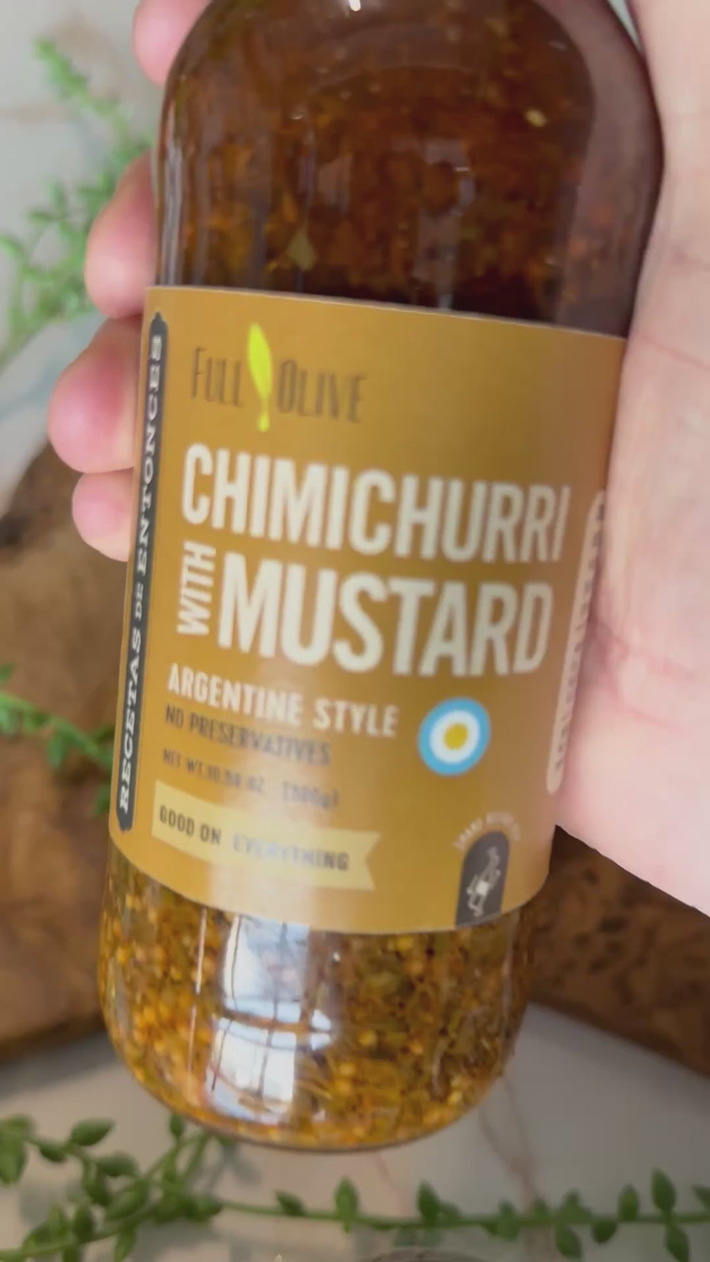 A video of Argentine Style Chimichurri with Mustard sauce being poured over a cracker